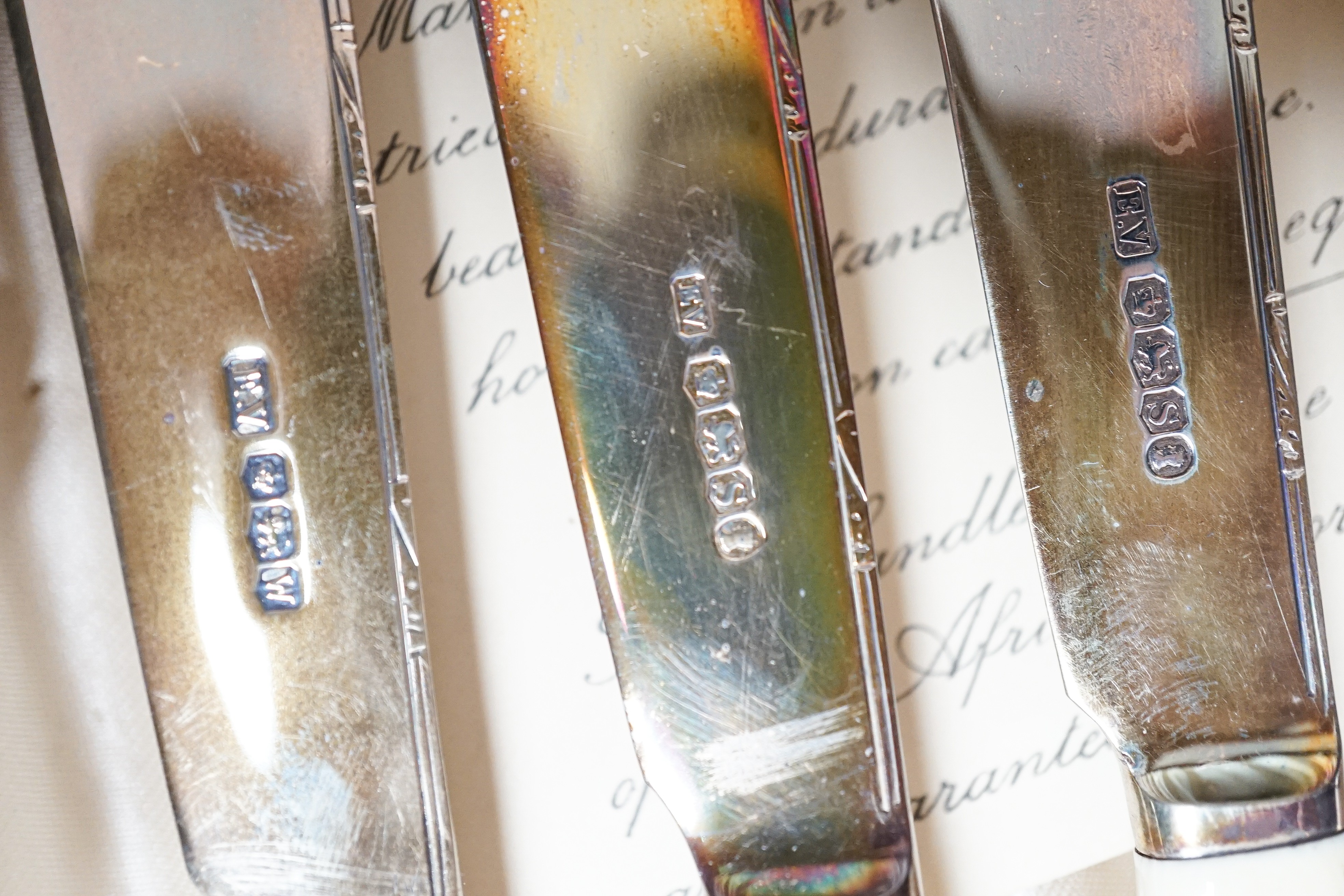 A 1930's cased set of six pairs of ivory handled silver dessert eaters by Viners Ltd, Sheffield, 1936/8/9, gross weight 13.5oz.